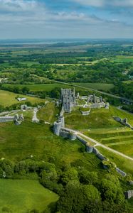 Preview wallpaper castle, fence, ruins, fields, trees, landscape, aerial  view