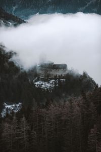 Preview wallpaper castle, fortress, hill, forest, clouds