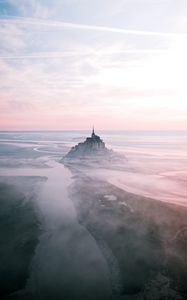 Preview wallpaper castle, island, hill, fog, aerial view