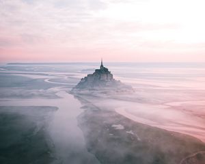 Preview wallpaper castle, island, hill, fog, aerial view