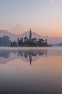 Preview wallpaper castle, island, lake, reflection, mountains