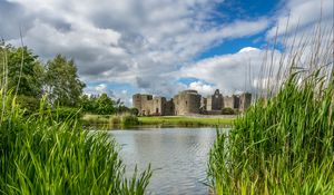 Preview wallpaper castle, lake, stones, grass