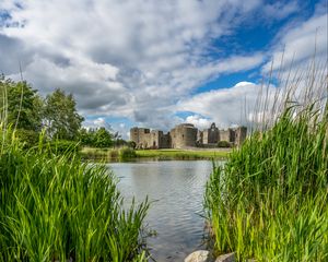 Preview wallpaper castle, lake, stones, grass