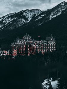 Preview wallpaper castle, mountains, trees, snow, winter, canada