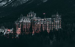 Preview wallpaper castle, mountains, trees, snow, winter, canada