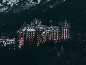 Preview wallpaper castle, mountains, trees, snow, winter, canada