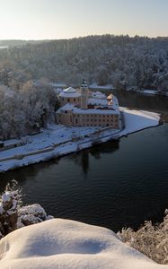 Preview wallpaper castle, river, trees, snow, winter