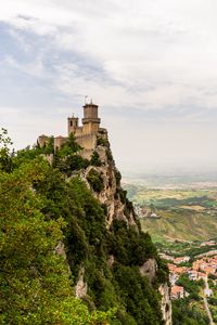 Preview wallpaper castle, rock, bushes