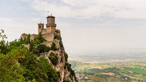 Preview wallpaper castle, rock, bushes