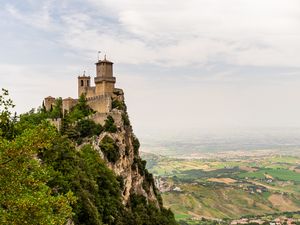 Preview wallpaper castle, rock, bushes