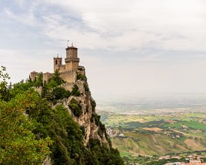 Preview wallpaper castle, rock, bushes