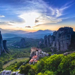 Preview wallpaper castle, rocks, valley, trees, distance