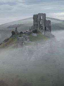 Preview wallpaper castle, ruins, mountain, fog