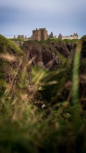 Preview wallpaper castle, slope, cliff, building, grass