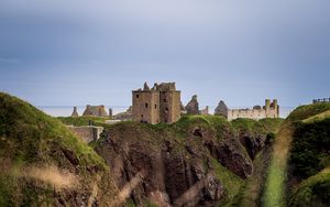 Preview wallpaper castle, slope, cliff, building, grass