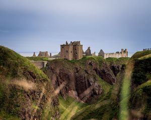 Preview wallpaper castle, slope, cliff, building, grass