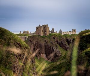 Preview wallpaper castle, slope, cliff, building, grass