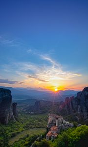 Preview wallpaper castle, sun, rays, rocks