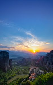 Preview wallpaper castle, sun, rays, rocks