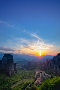 Preview wallpaper castle, sun, rays, rocks