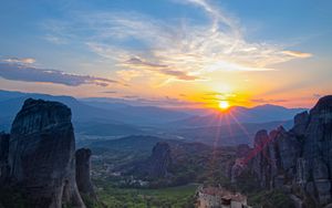 Preview wallpaper castle, sun, rays, rocks