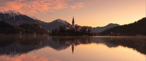 Preview wallpaper castle, tower, mountains, lake, reflection