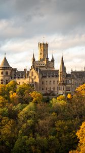 Preview wallpaper castle, towers, trees, forest, autumn