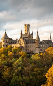 Preview wallpaper castle, towers, trees, forest, autumn