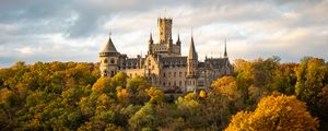 Preview wallpaper castle, towers, trees, forest, autumn