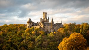 Preview wallpaper castle, towers, trees, forest, autumn