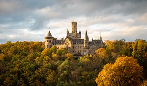 Preview wallpaper castle, towers, trees, forest, autumn