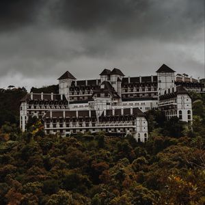 Preview wallpaper castle, trees, clouds, overcast