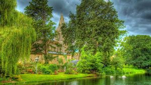 Preview wallpaper castle, vegetation, lake, green, colors