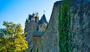 Preview wallpaper castle, wall, hill, tree, grass