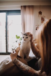 Preview wallpaper cat, pet, girl, friendship