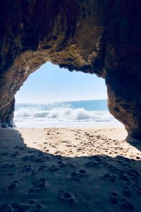 Preview wallpaper cave, arch, beach, sea, sand