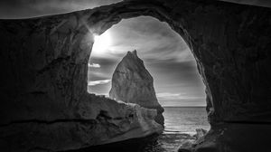 Preview wallpaper cave, arch, rock, sea, landscape, black and white