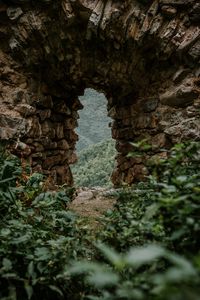 Preview wallpaper cave, arch, stones, grass