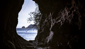 Preview wallpaper cave, branches, view, sea