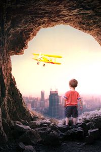 Preview wallpaper cave, child, plane, city, view