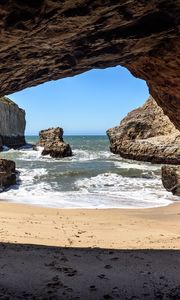 Preview wallpaper cave, coast, sea, rocks, view