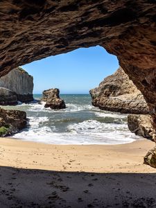 Preview wallpaper cave, coast, sea, rocks, view