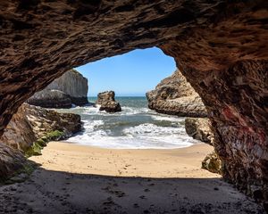 Preview wallpaper cave, coast, sea, rocks, view