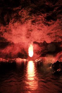 Preview wallpaper cave, fireball, reflection, water, blazing, bright