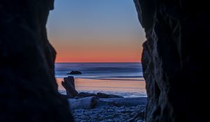 Preview wallpaper cave, horizon, sunset