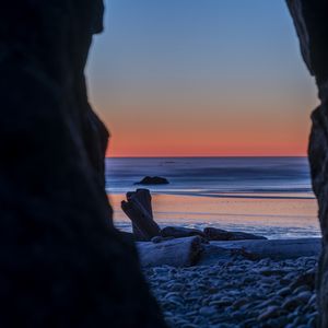 Preview wallpaper cave, horizon, sunset