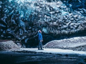 Preview wallpaper cave, ice, glacier, man, journey