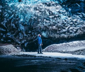 Preview wallpaper cave, ice, glacier, man, journey