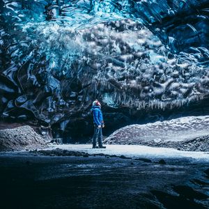 Preview wallpaper cave, ice, glacier, man, journey