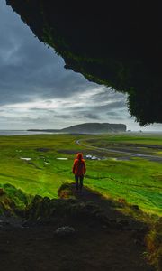 Preview wallpaper cave, man, landscape, coast, greenery